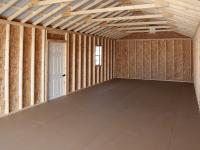 14x36 Peak Style One-Car Garage with a diamond tread plate at the entry way From Pine Creek Structures