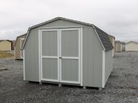 Pine Creek 10x12 HD Mini Barn with Light Gray walls, White trim and White shutters, and Charcoal shingles