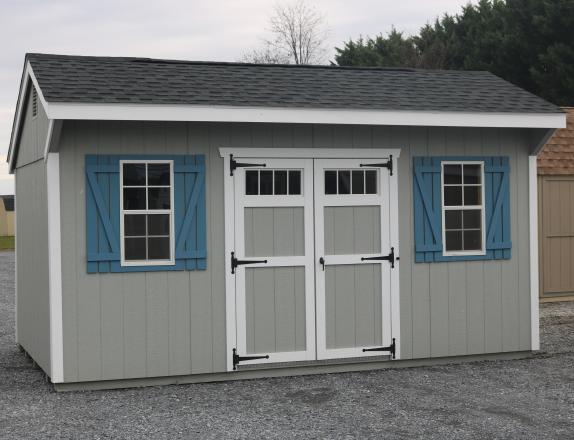 Pine Creek 10x16 Cottage with Light Gray walls, White trim and Light Blue Z-Style shutters, and Charcoal shingles